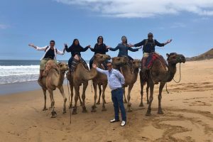 Enjoy your camel ride along the atlantic beach